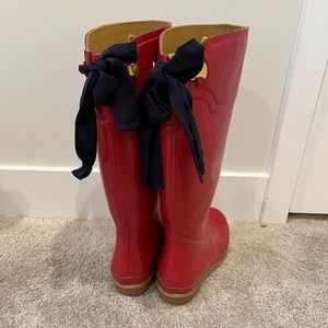 Joules Res Rainboots with blue ribbon bows in back